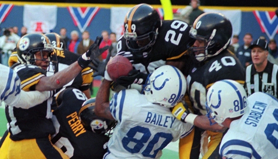 Indianapolis Colts Aaron Bailey (80) can't handle a touchdown pass from quarterback Jim Harbaugh in the last play of the game aganist the Pittsburgh Steelers in Pittsburgh Sunday Jan. 14, 1996 as the Steelers Darren Perry (39), Randy Fuller (29), Myron Bell (40)and Carnell Lake (37) look on with the Colts Brian Stablien (86). The Steelers won 20-16. (AP Photo/Keith Srakocic)